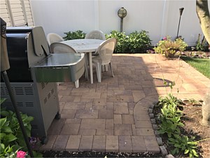 nicolock golden brown stone ridge patio in front of shed plainview